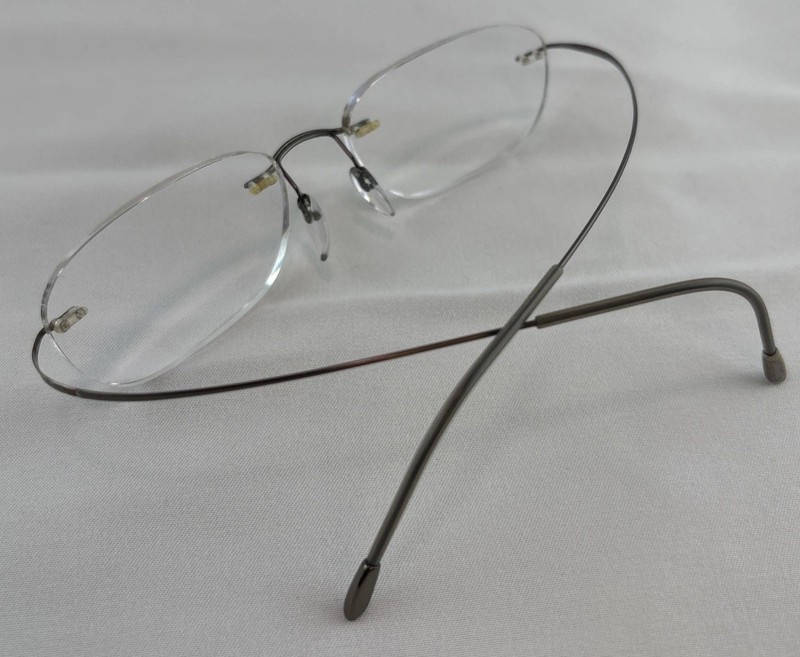 Silhouette Eyeglasses 7799 40 6102 Titan Rimless Frame Austria 49[]19 150 w/Case gallery