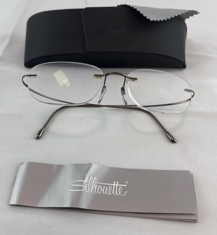 Silhouette Eyeglasses 7799 40 6102 Titan Rimless Frame Austria 49[]19 150 w/Case gallery