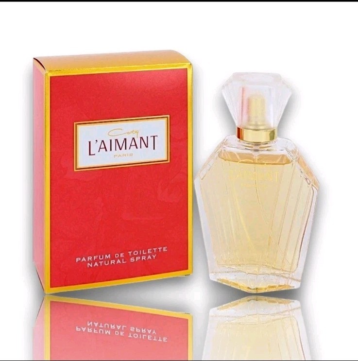 L’Aimant for Women by Coty Parfum de Toilette Spray 1.7 oz – New in Box