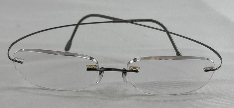 Silhouette Eyeglasses 7799 40 6102 Titan Rimless Frame Austria 49[]19 150 w/Case gallery